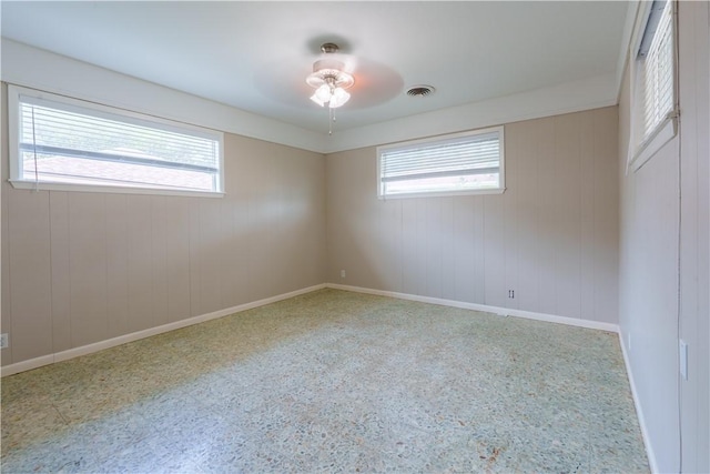 253 Melrose, Corpus Christi, TX 78404 - unfurnished room with baseboards and speckle patterned floor