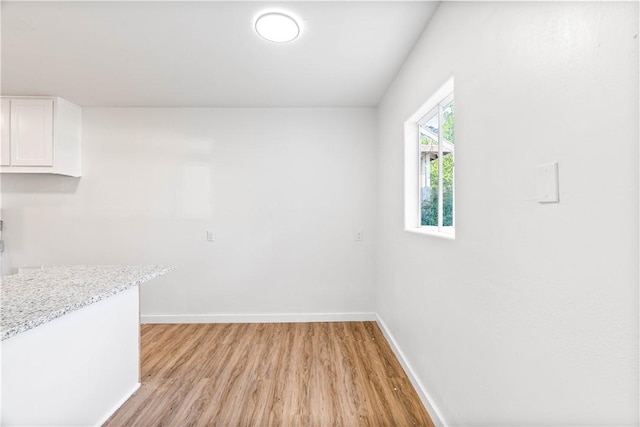 1601 Cambridge Dr, Corpus Christi, TX 78415 - unfurnished dining area with light wood-style flooring