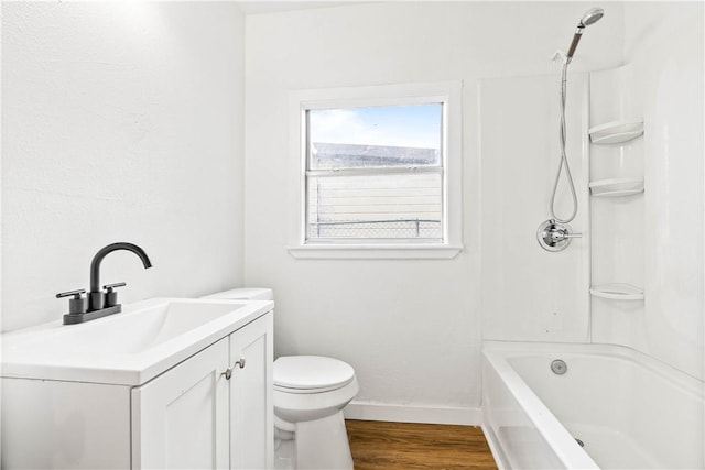 1601 Cambridge Dr, Corpus Christi, TX 78415 - full bath with vanity, wood finished floors, and shower / washtub combination