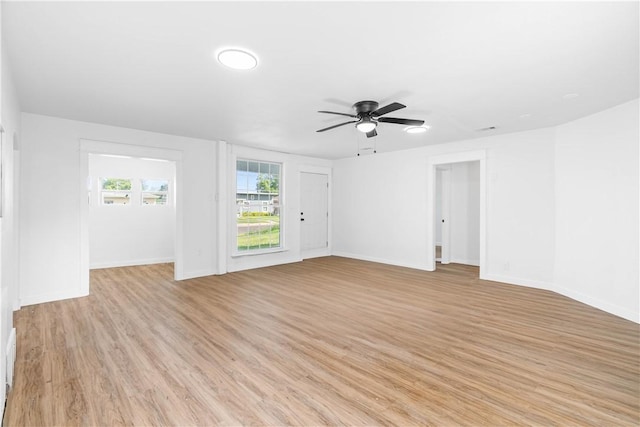 1601 Cambridge Dr, Corpus Christi, TX 78415 - unfurnished living room featuring light wood finished floors and ceiling fan