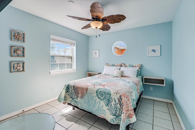 tiled bedroom with ceiling fan