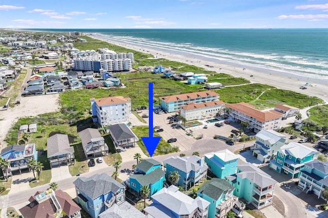 aerial view with a view of the beach and a water view