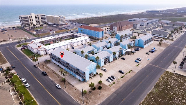 bird's eye view with a view of the beach and a water view