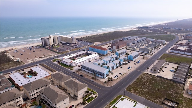 aerial view with a view of the beach and a water view