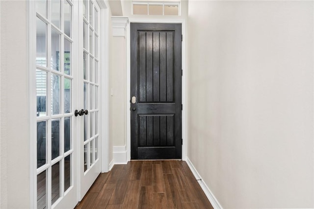 doorway featuring dark hardwood / wood-style floors and french doors