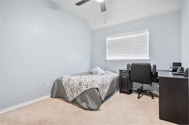 bedroom featuring lofted ceiling, light carpet, and ceiling fan