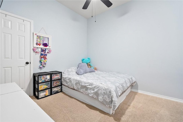 bedroom with light colored carpet and ceiling fan