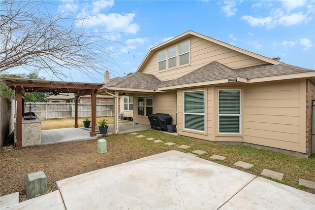 rear view of property with a patio