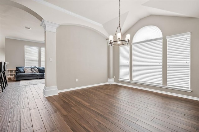 unfurnished room with lofted ceiling, crown molding, dark wood-type flooring, and ornate columns