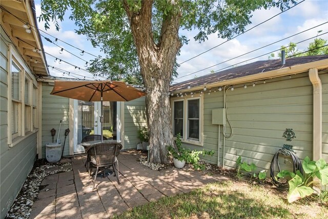 spare room with hardwood / wood-style floors, ceiling fan, and crown molding