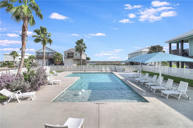 view of swimming pool with a patio area