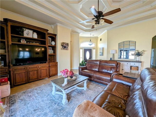 living room featuring ceiling fan, ornamental molding, and light tile patterned flooring