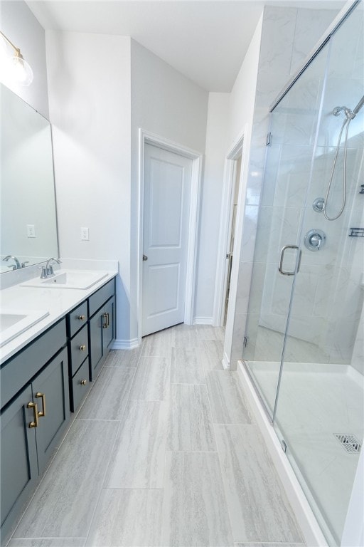 2634 Westeros St, Corpus Christi, TX 78415 - bathroom with double vanity and a stall shower