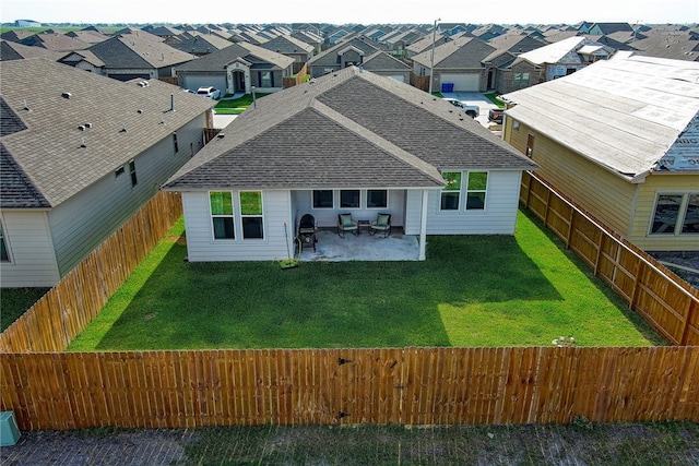 2634 Westeros St, Corpus Christi, TX 78415 - rear view of house with a shingled roof, a fenced backyard, a patio, and a residential view