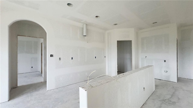 kitchen with arched walkways
