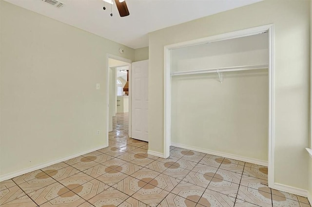 1225 Calle, San Carlos, Corpus Christi, TX 78417 - unfurnished bedroom featuring light tile patterned floors, a closet, and ceiling fan