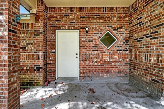 1225 Calle, San Carlos, Corpus Christi, TX 78417 - doorway to property featuring brick siding