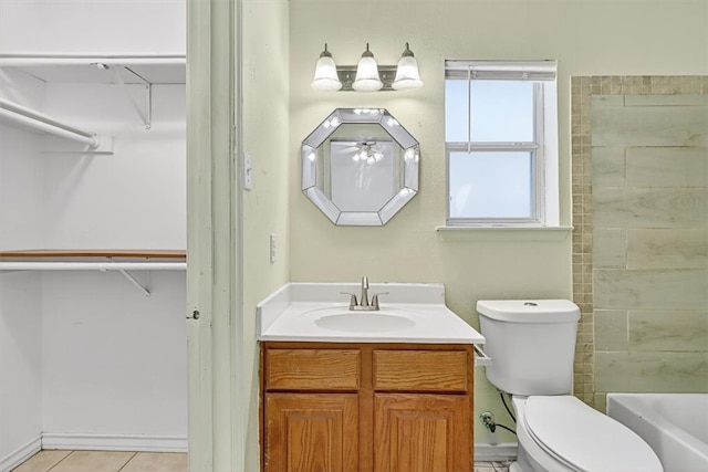 1225 Calle, San Carlos, Corpus Christi, TX 78417 - bathroom featuring vanity, tile patterned floors, ceiling fan,  shower combination, and a spacious closet