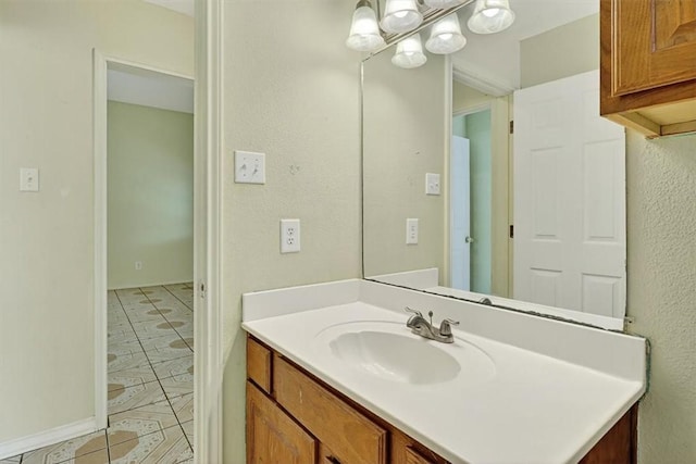 1225 Calle, San Carlos, Corpus Christi, TX 78417 - bathroom with vanity, tile patterned flooring, and a textured wall