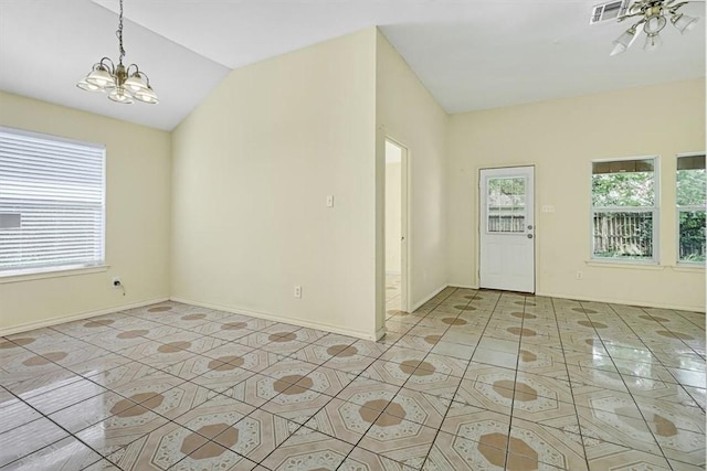 1225 Calle, San Carlos, Corpus Christi, TX 78417 - unfurnished room with plenty of natural light, a chandelier, light tile patterned flooring, and vaulted ceiling