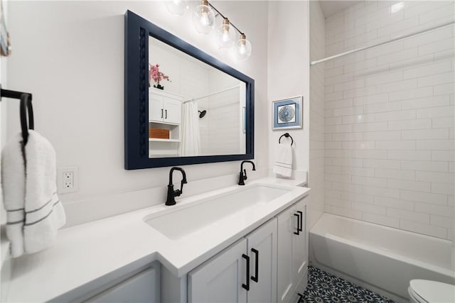 full bath featuring shower / bath combination with curtain, vanity, and toilet