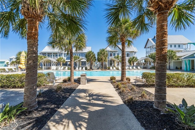 community pool featuring a residential view