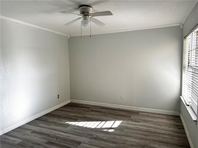 unfurnished room featuring dark hardwood / wood-style flooring, ceiling fan, and ornamental molding