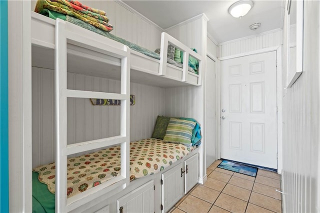 mudroom with light tile patterned flooring