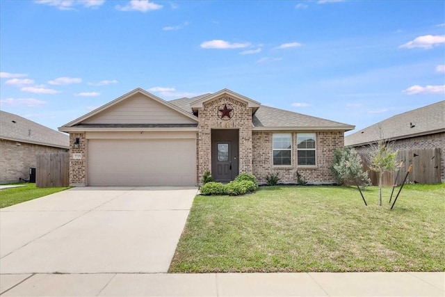 7725 Iron Man Dr, Corpus Christi, TX 78414 - ranch-style home featuring fence, driveway, brick siding, a front yard, and a garage