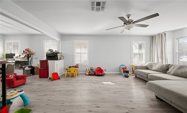 game room featuring light hardwood / wood-style flooring and ceiling fan