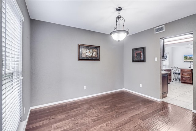 empty room featuring light hardwood / wood-style floors