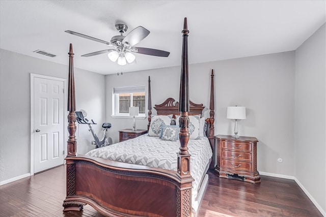 bedroom featuring dark hardwood / wood-style floors and ceiling fan