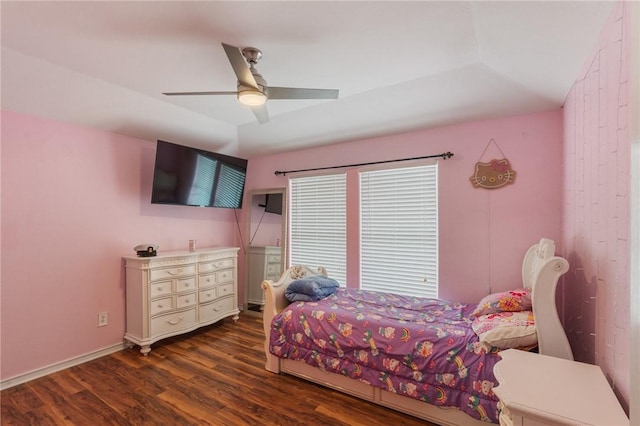 bedroom featuring dark hardwood / wood-style flooring and ceiling fan