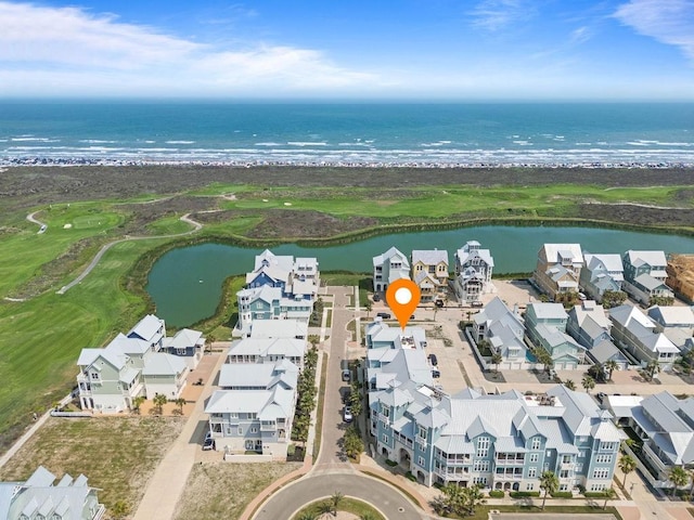 birds eye view of property with a residential view, a water view, and golf course view
