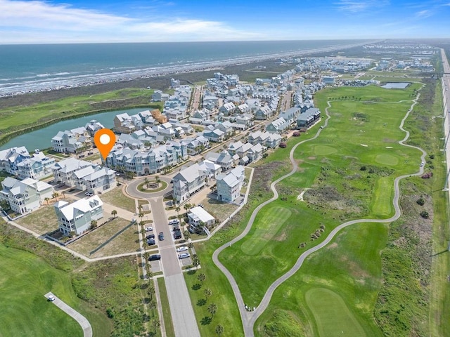 birds eye view of property with a residential view, a water view, and golf course view