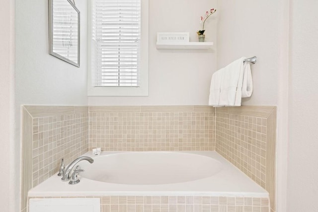 full bath with a garden tub