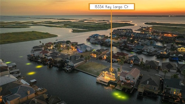 15334 Key Largo Ct, Corpus Christi, TX 78418 - aerial view at dusk of a water view and a residential view