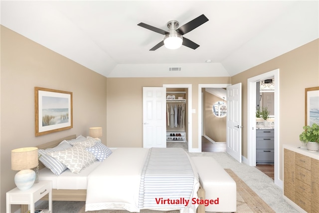 15334 Key Largo Ct, Corpus Christi, TX 78418 - carpeted bedroom with vaulted ceiling, ensuite bath, ceiling fan, and baseboards