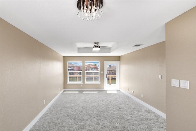 15334 Key Largo Ct, Corpus Christi, TX 78418 - unfurnished room with carpet flooring, baseboards, and a raised ceiling
