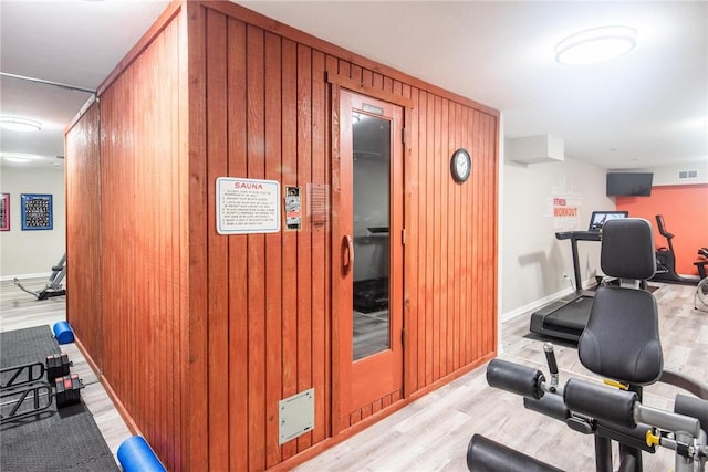 1400 Ocean Dr Unit 304C, Corpus Christi, TX 78404 - workout room featuring wood walls and wood finished floors