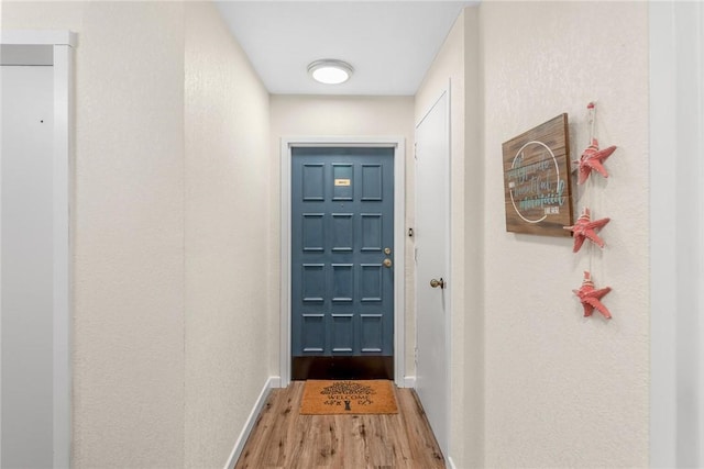 1400 Ocean Dr Unit 304C, Corpus Christi, TX 78404 - entryway with wood finished floors and baseboards