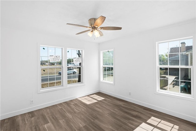 1113 Annapolis Dr, Corpus Christi, TX 78404 - unfurnished room featuring plenty of natural light, wood finished floors, baseboards, and ceiling fan