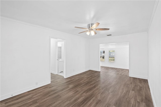1113 Annapolis Dr, Corpus Christi, TX 78404 - spare room with a ceiling fan, ornamental molding, dark wood finished floors, and baseboards