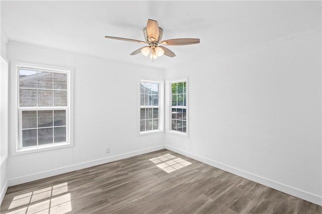 1113 Annapolis Dr, Corpus Christi, TX 78404 - empty room featuring baseboards, a ceiling fan, and wood finished floors