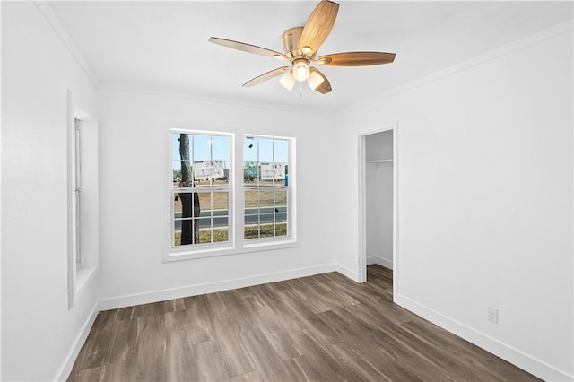 1113 Annapolis Dr, Corpus Christi, TX 78404 - unfurnished bedroom with dark wood-style floors, ornamental molding, baseboards, ceiling fan, and a closet