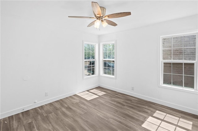 1113 Annapolis Dr, Corpus Christi, TX 78404 - empty room featuring wood finished floors, a ceiling fan, and baseboards