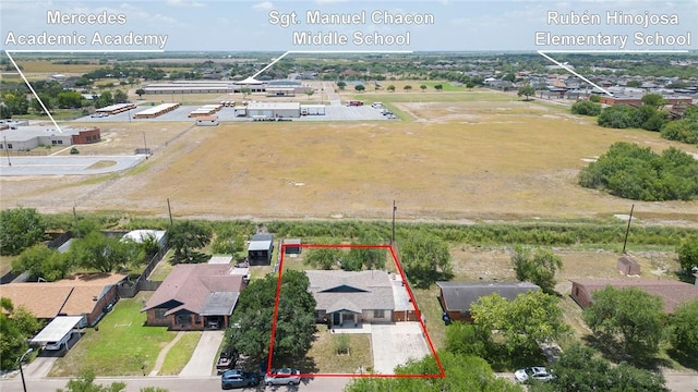 1124 Orange St, Mercedes, TX 78570 - aerial view of property and surrounding area with property boundaries highlighted