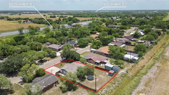 1124 Orange St, Mercedes, TX 78570 - aerial perspective of suburban area with property parcel outlined