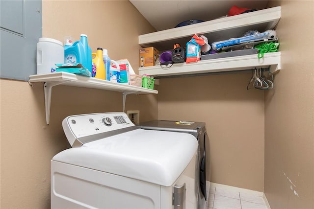 1124 Orange St, Mercedes, TX 78570 - washroom featuring independent washer and dryer and tile patterned flooring