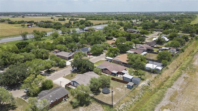1124 Orange St, Mercedes, TX 78570 - aerial view of residential area featuring a tree filled landscape